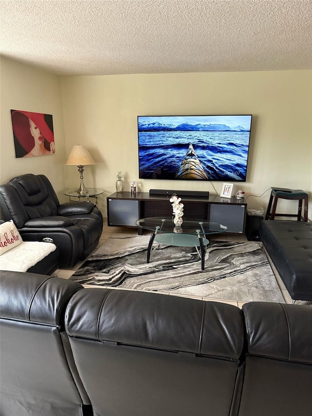 6831 SW 147th Ave Unit 3H, Miami, FL 33193 - living room featuring a textured ceiling