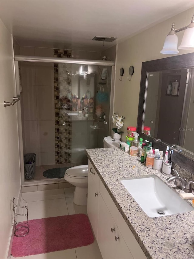 6831 SW 147th Ave Unit 3H, Miami, FL 33193 - bathroom with vanity, a stall shower, and tile patterned floors
