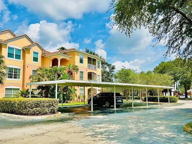 13500 Turtle Marsh Loop Unit 17, Orlando, FL 32837 - view of property's community with covered parking