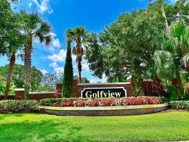 13500 Turtle Marsh Loop Unit 17, Orlando, FL 32837 - community / neighborhood sign with a yard