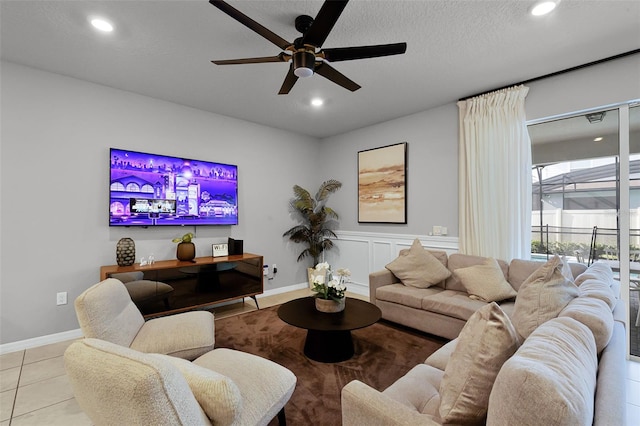 2131 Lelani Cir, Davenport, FL 33897 - tiled living area with ceiling fan, recessed lighting, and a wainscoted wall