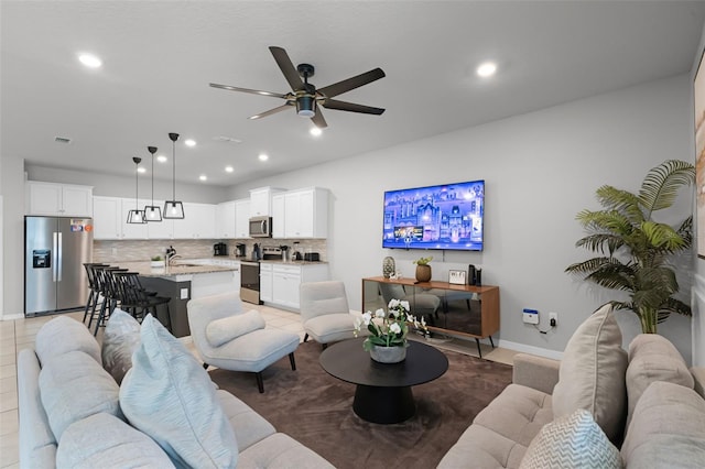 2131 Lelani Cir, Davenport, FL 33897 - living area with a ceiling fan and recessed lighting