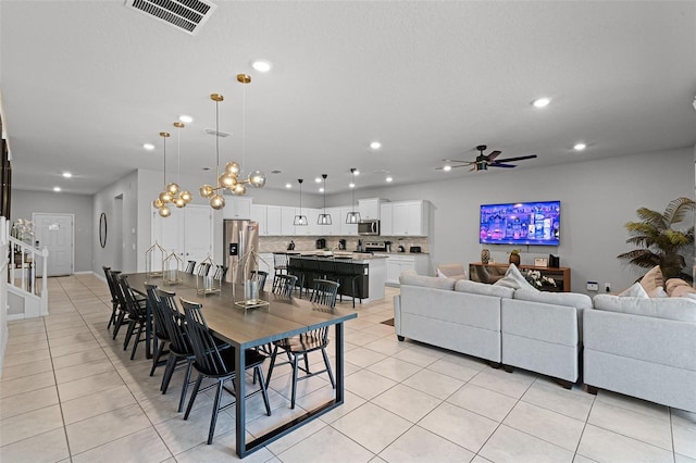 2131 Lelani Cir, Davenport, FL 33897 - dining space with a ceiling fan, recessed lighting, and light tile patterned floors