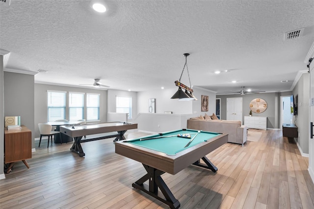 2131 Lelani Cir, Davenport, FL 33897 - game room with ceiling fan, ornamental molding, light wood-type flooring, billiards, and a textured ceiling