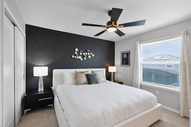 2131 Lelani Cir, Davenport, FL 33897 - carpeted bedroom featuring a closet and ceiling fan