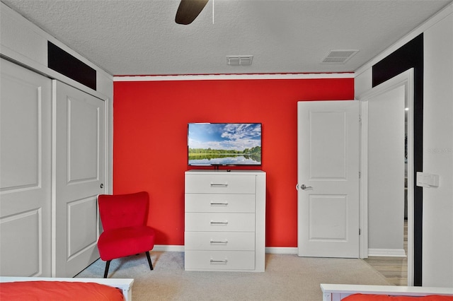 2131 Lelani Cir, Davenport, FL 33897 - bedroom with carpet flooring, a closet, a textured ceiling, and ceiling fan