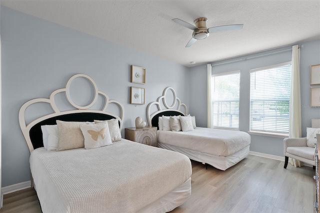2131 Lelani Cir, Davenport, FL 33897 - bedroom featuring wood finished floors and ceiling fan