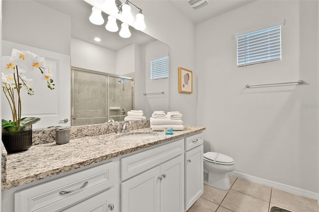 2131 Lelani Cir, Davenport, FL 33897 - bathroom with vanity, tiled shower, and tile patterned flooring