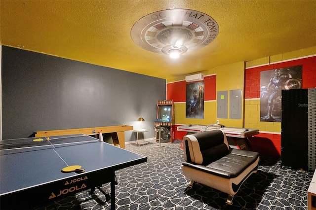 2131 Lelani Cir, Davenport, FL 33897 - rec room featuring electric panel, a textured ceiling, and a ceiling fan