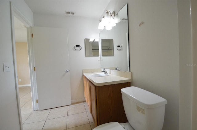 1207 Atlantic Ct, Kissimmee, FL 34759 - half bathroom featuring vanity and tile patterned flooring