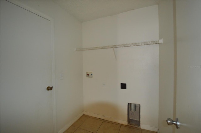 1207 Atlantic Ct, Kissimmee, FL 34759 - washroom with hookup for a washing machine, light tile patterned floors, and hookup for an electric dryer
