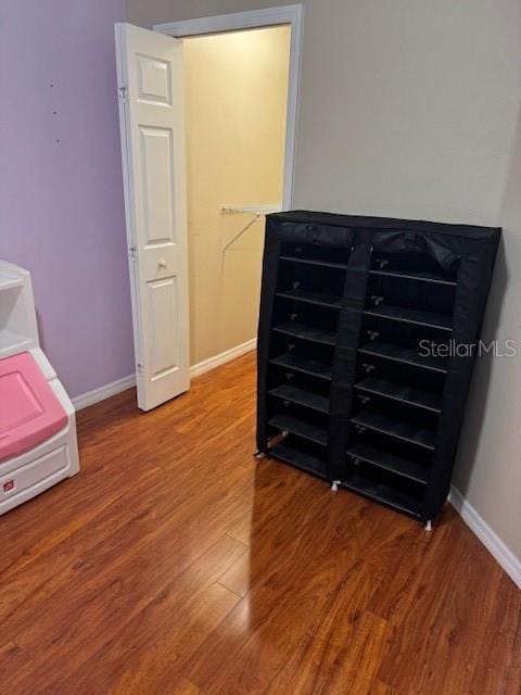 5435 Bryce Canyon Dr, Kissimmee, FL 34758 - bedroom featuring wood finished floors and baseboards