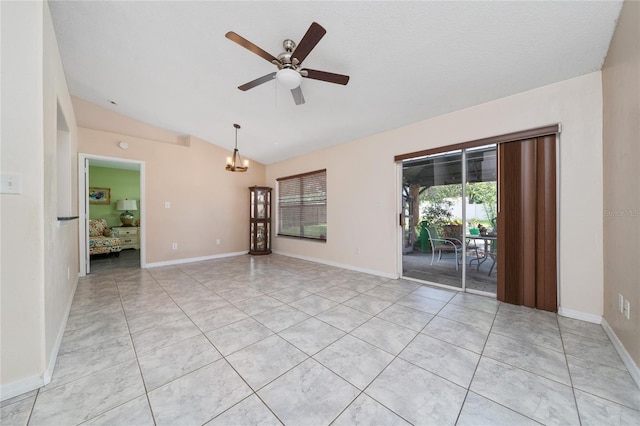 11649 Crescent Pines Blvd, Clermont, FL 34711 - spare room with lofted ceiling, ceiling fan, a chandelier, and light tile patterned floors