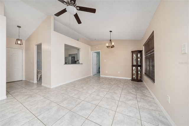 11649 Crescent Pines Blvd, Clermont, FL 34711 - unfurnished living room with vaulted ceiling, ceiling fan, a chandelier, and light tile patterned flooring