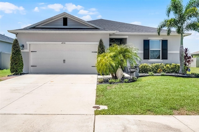 2436 Bulrush Dr, Saint Cloud, FL 34769 - ranch-style house featuring a front yard, concrete driveway, a garage, and stucco siding