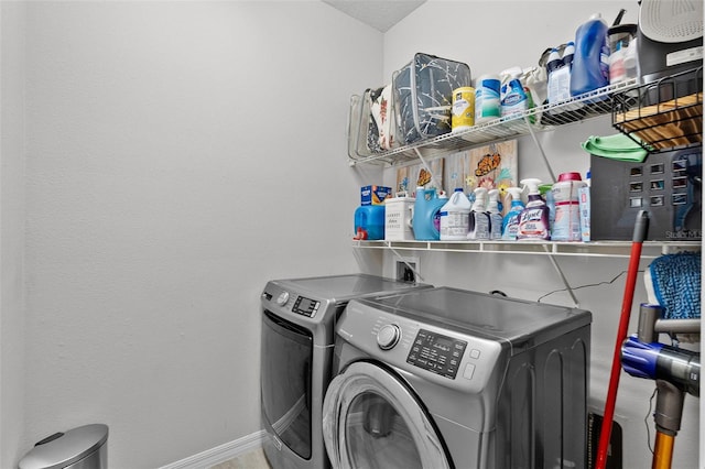 2436 Bulrush Dr, Saint Cloud, FL 34769 - washroom with separate washer and dryer and baseboards