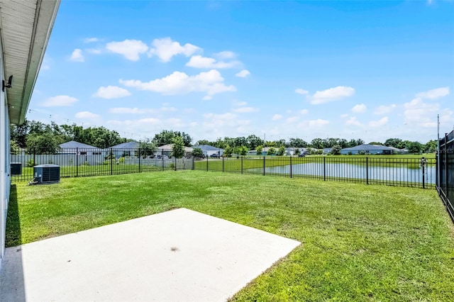 2436 Bulrush Dr, Saint Cloud, FL 34769 - fenced backyard featuring a patio and a water view
