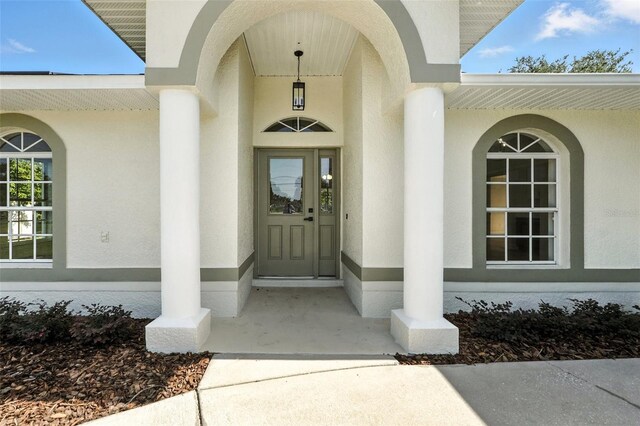 4635 Deer Run Rd, Saint Cloud, FL 34772 - doorway to property featuring stucco siding