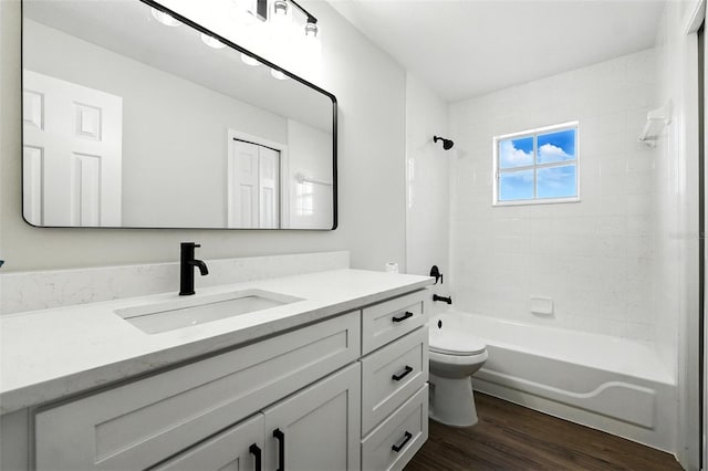 4635 Deer Run Rd, Saint Cloud, FL 34772 - full bathroom featuring vanity, wood finished floors, and shower / bathtub combination