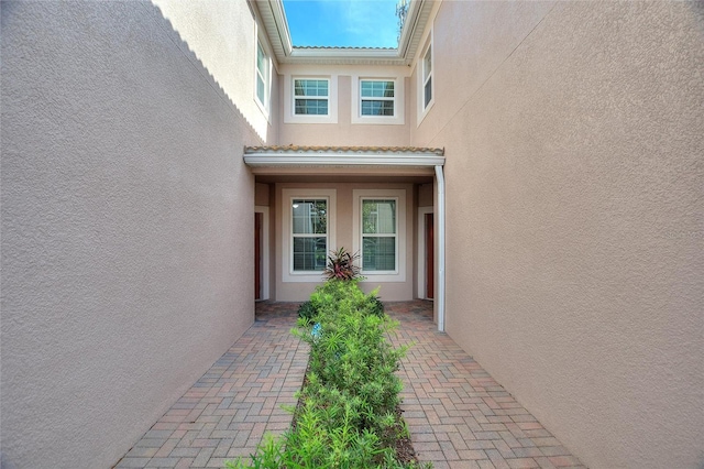 8309 Bella Vida Cir Unit 8309, Davenport, FL 33896 - entrance to property with stucco siding