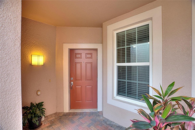 8309 Bella Vida Cir Unit 8309, Davenport, FL 33896 - property entrance featuring stucco siding