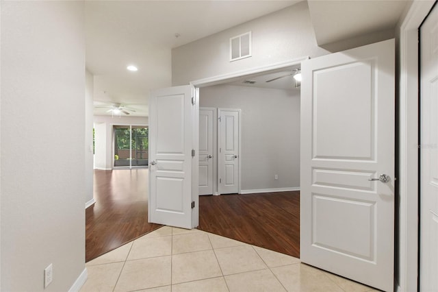 8309 Bella Vida Cir Unit 8309, Davenport, FL 33896 - hallway featuring tile patterned flooring and recessed lighting