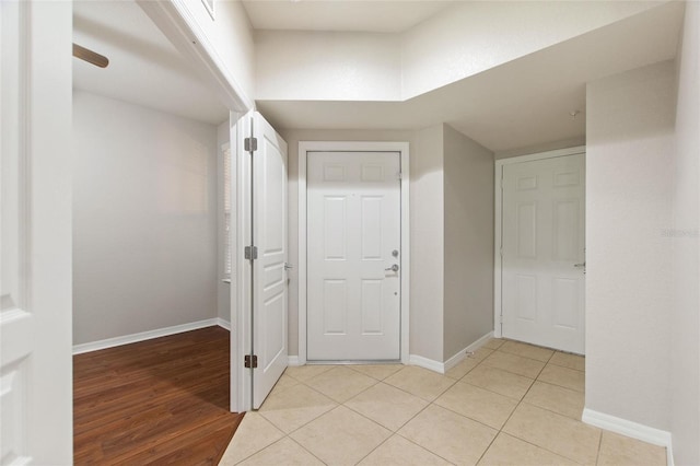 8309 Bella Vida Cir Unit 8309, Davenport, FL 33896 - hallway with baseboards and light wood-style flooring