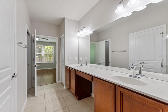 8309 Bella Vida Cir Unit 8309, Davenport, FL 33896 - bathroom with double vanity, tile patterned flooring, and ceiling fan
