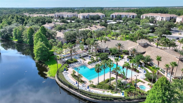 8309 Bella Vida Cir Unit 8309, Davenport, FL 33896 - aerial view of residential area with a pool and a large body of water