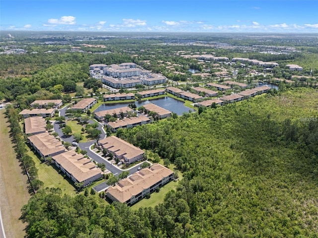 8309 Bella Vida Cir Unit 8309, Davenport, FL 33896 - aerial view of property and surrounding area with a forest
