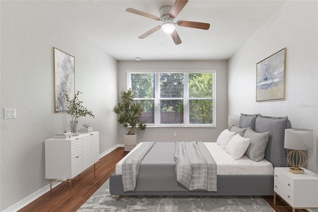 8309 Bella Vida Cir Unit 8309, Davenport, FL 33896 - bedroom featuring wood finished floors and ceiling fan