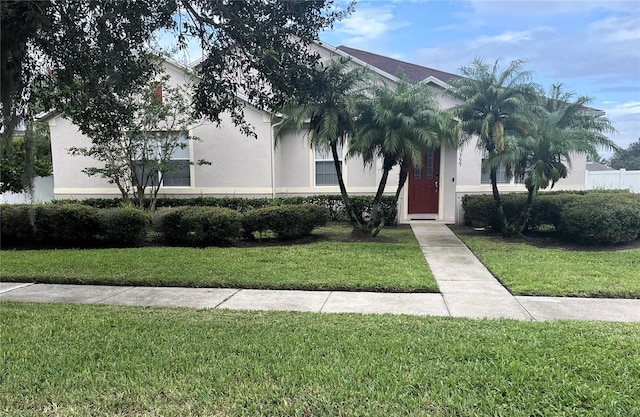 3799 Cedar Hammock Trl, Saint Cloud, FL 34772 - view of front of home with stucco siding and a front yard
