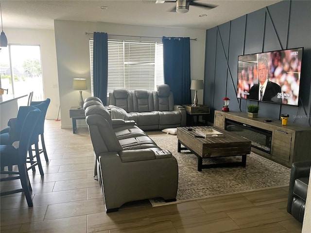 3799 Cedar Hammock Trl, Saint Cloud, FL 34772 - living room with wood tiled floors and a ceiling fan