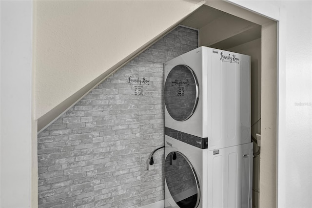 1645 Windsor Oak Ct, Kissimmee, FL 34744 - laundry view of stacked washer and clothes dryer