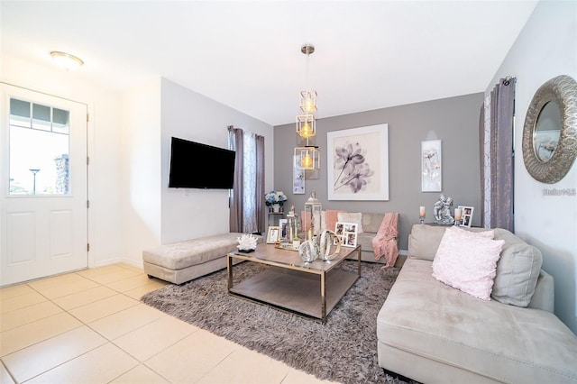 2463 Volunteer Ave, Kissimmee, FL 34744 - living room featuring tile patterned floors and baseboards