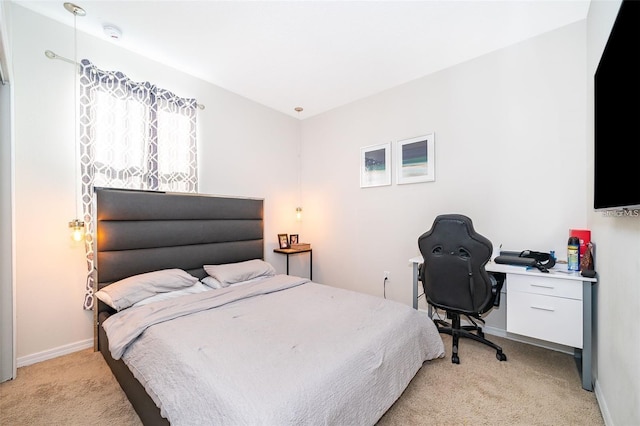 2463 Volunteer Ave, Kissimmee, FL 34744 - bedroom featuring light colored carpet and a desk