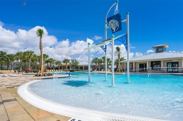 2463 Volunteer Ave, Kissimmee, FL 34744 - community pool with a patio area