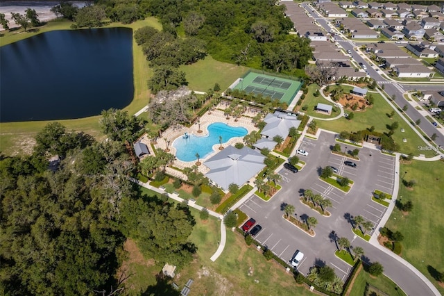 2463 Volunteer Ave, Kissimmee, FL 34744 - view of property location featuring a pool and a large body of water