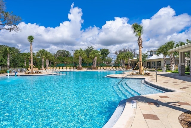2463 Volunteer Ave, Kissimmee, FL 34744 - community pool with a patio