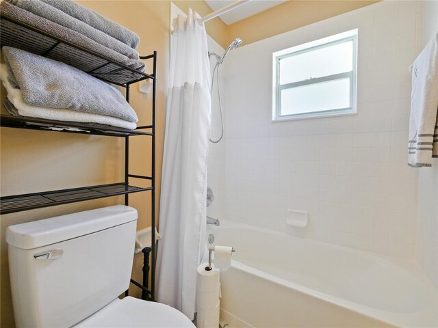 314 Clermont Dr, Kissimmee, FL 34759 - full bathroom featuring toilet and shower / tub combo