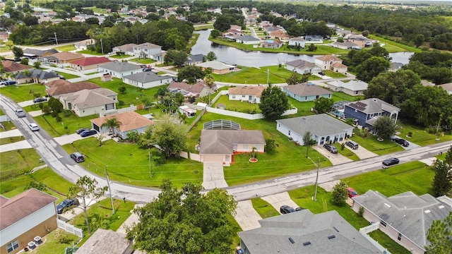 314 Clermont Dr, Kissimmee, FL 34759 - aerial perspective of suburban area with a nearby body of water