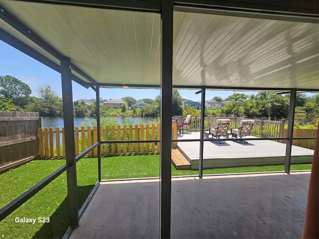 407 Darlington Loop, Davenport, FL 33896 - unfurnished sunroom featuring a water view