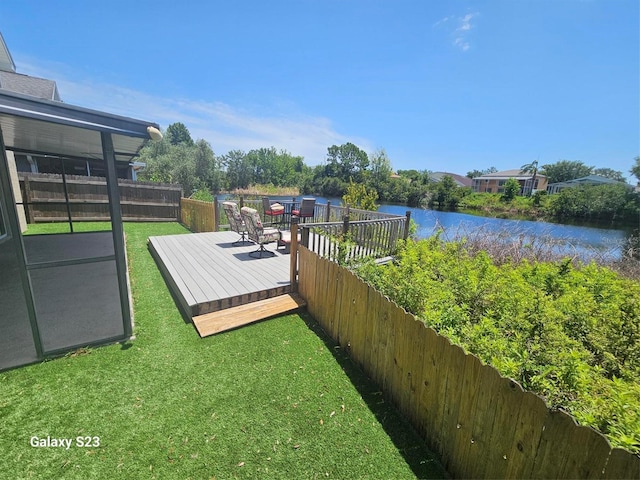 407 Darlington Loop, Davenport, FL 33896 - view of yard with a deck with water view