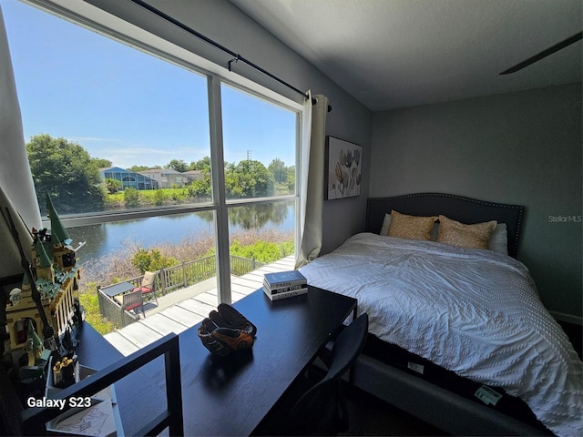 407 Darlington Loop, Davenport, FL 33896 - bedroom featuring a water view