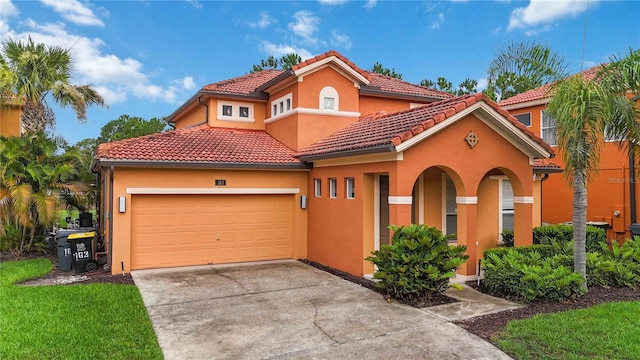 163 Tigerlily Ct, Davenport, FL 33837 - mediterranean / spanish house featuring driveway, a garage, stucco siding, and a tiled roof