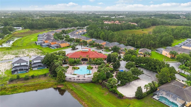 163 Tigerlily Ct, Davenport, FL 33837 - aerial perspective of suburban area featuring a nearby body of water