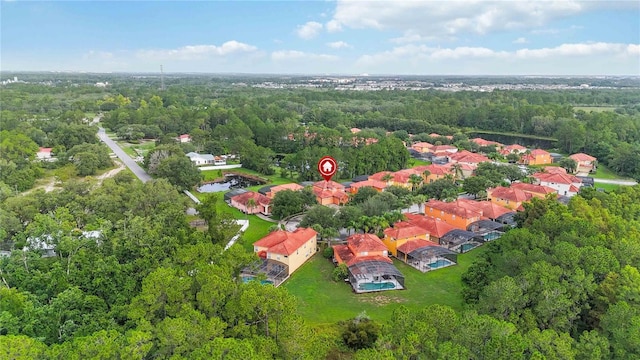 163 Tigerlily Ct, Davenport, FL 33837 - aerial view of a heavily wooded area