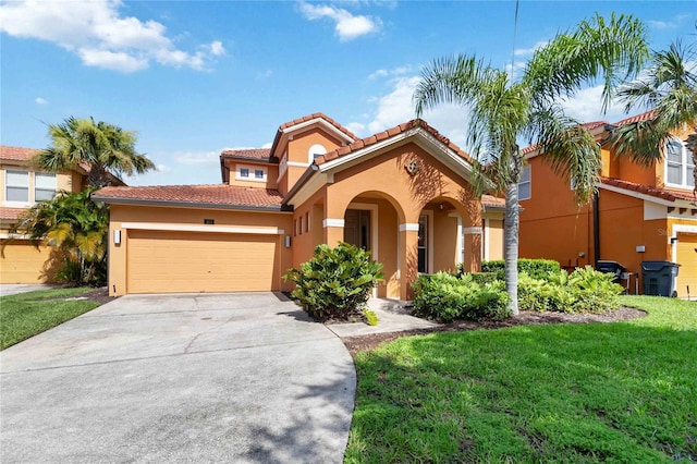 163 Tigerlily Ct, Davenport, FL 33837 - mediterranean / spanish house featuring a tile roof, stucco siding, a garage, concrete driveway, and a front lawn