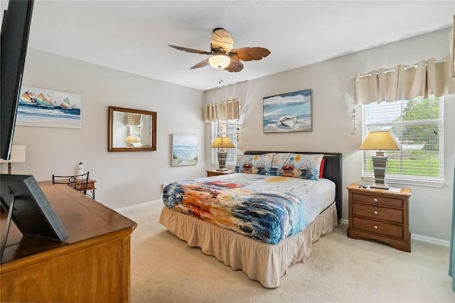 163 Tigerlily Ct, Davenport, FL 33837 - bedroom with light colored carpet and ceiling fan