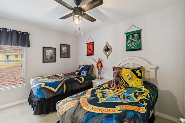 163 Tigerlily Ct, Davenport, FL 33837 - carpeted bedroom with baseboards and ceiling fan